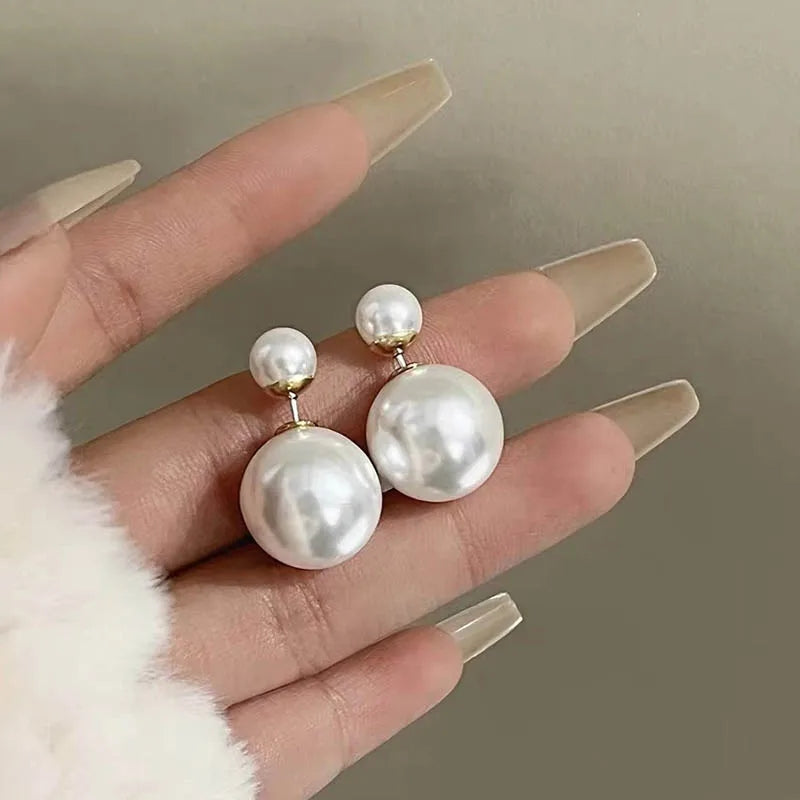 
                      
                        Vintage Double Sided Pearl STud
                      
                    