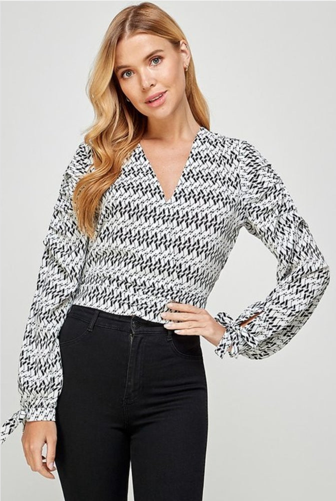 
                      
                        Long Sleeves Band Bottom Top
                      
                    